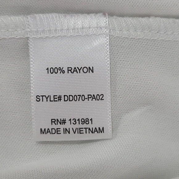 NAIF Boho Paisley Print Sleeveless Mini Dress in Soft Lightweight Fabric - Picture 8 of 8